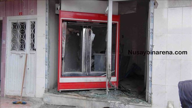 Nusaybin´de dün gece yaşanan çatışmalarda ev ve iş yerleri zarar gördü