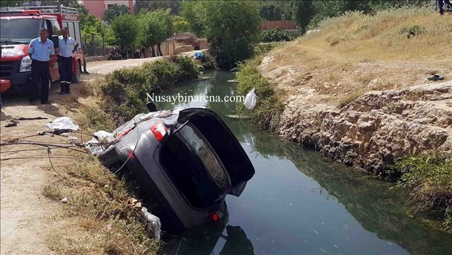 Nusaybin´de otomobil su kanalına devrildi, 2 kişi hayatını kaybetti